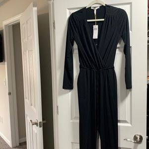 BCBGeneration Long Sleeve Black cutout jumpsuit